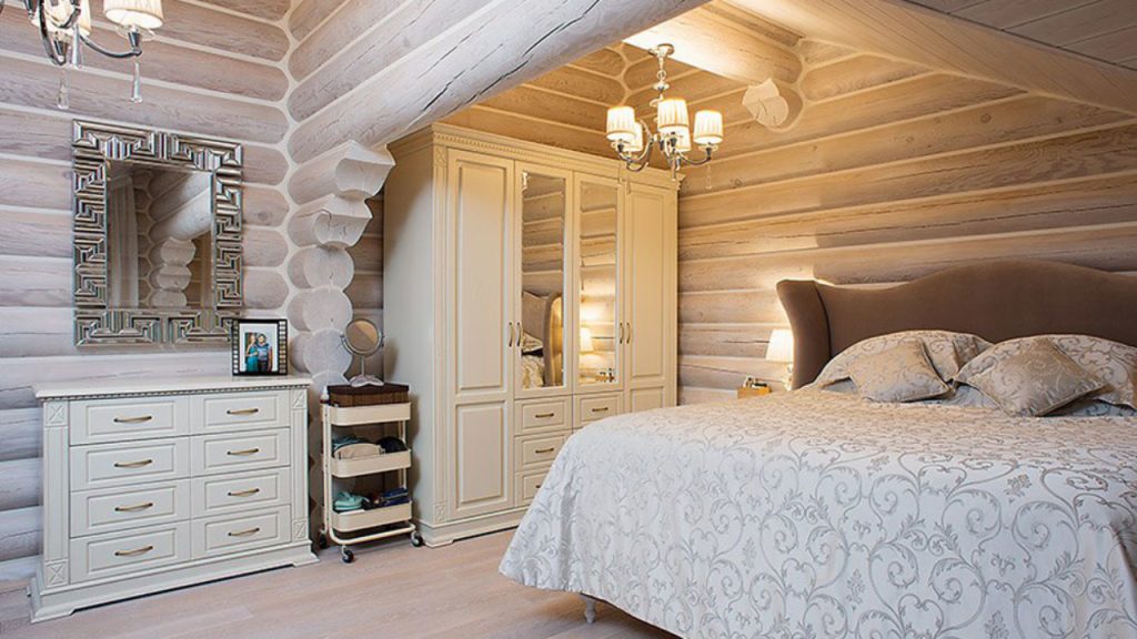 Спальня в деревянном доме. Обустройство комнаты в срубе из дерева