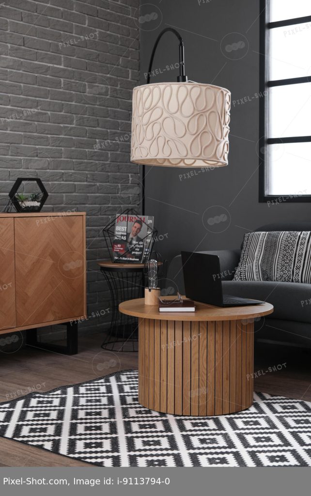 Интерьер модной гостиной с черным диваном и современным ноутбуком на  журнальном столике. :: Стоковая фотография :: Pixel-Shot Studio